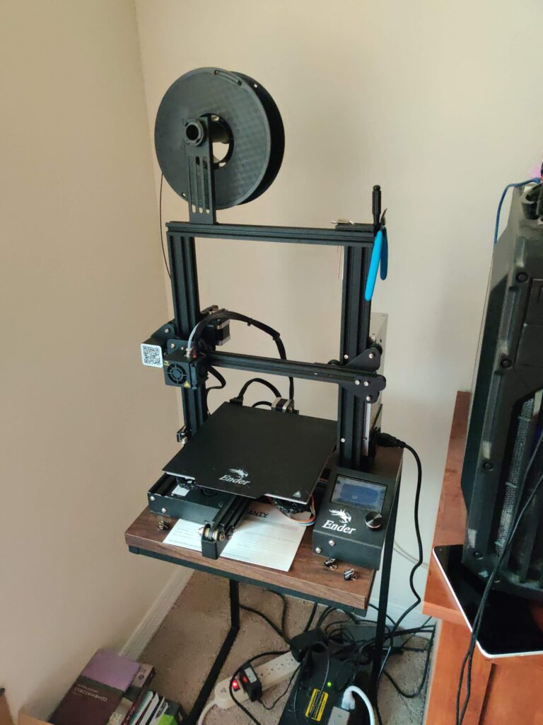 Author's Ender 3, a 3D printer, in stock configuration.